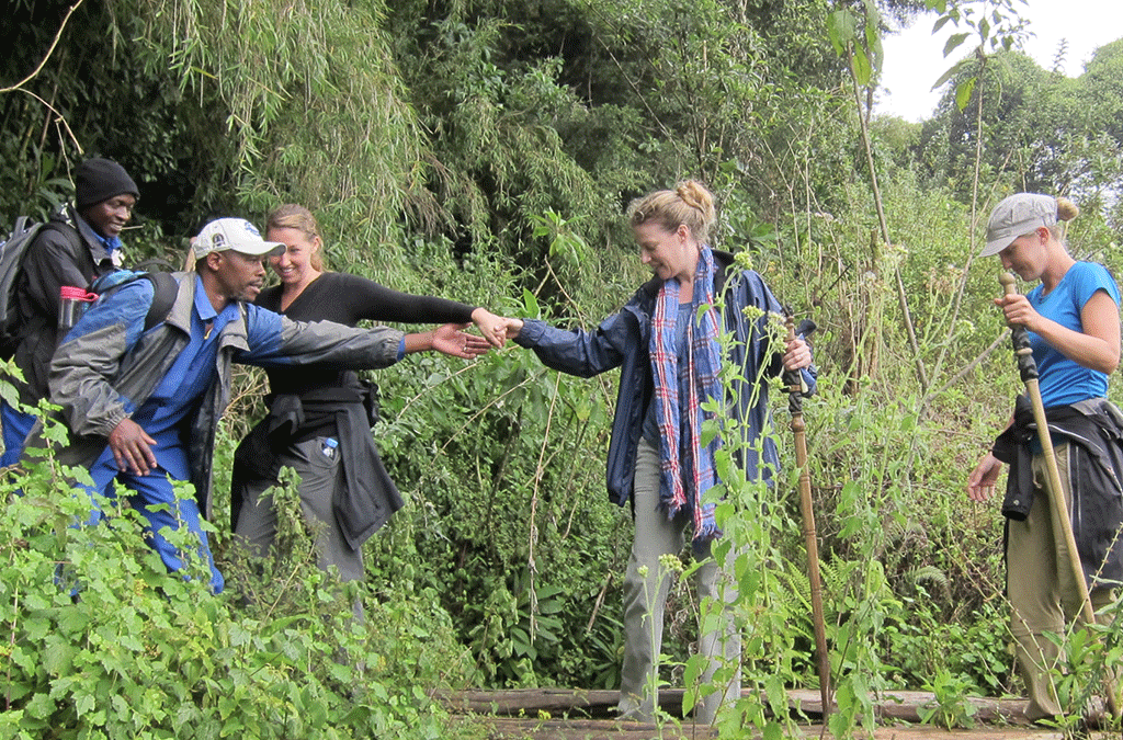 Why you should hire a porter while on a safari in Virunga? 2 Trekking porters in Why you should hire a porter while on a safari in Virunga?
