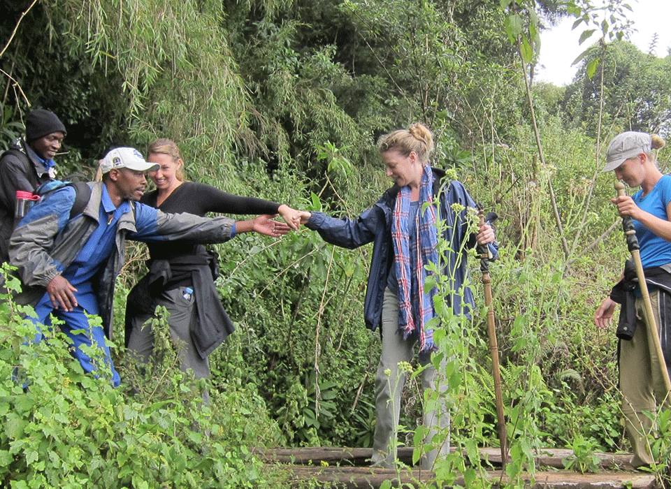 Trekking porters in Why you should hire a porter while on a safari in Virunga?