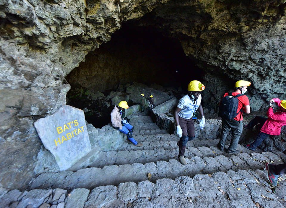 Tour the Musanze caves.